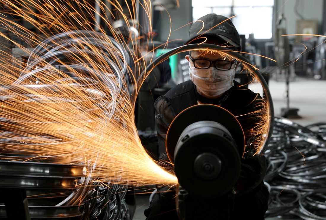 China's services sector growth races to 33-month high in February, survey shows