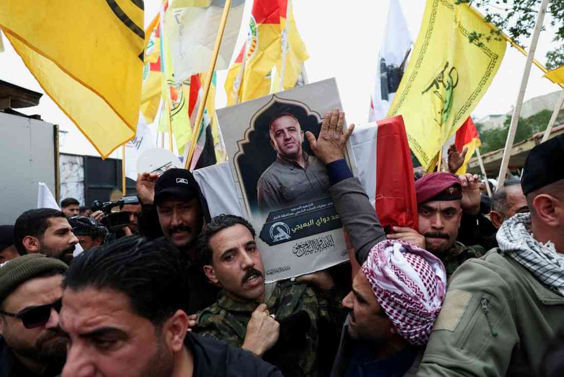 Airstrikes target HQ and leader of Iran-backed Shi'ite militia umbrella group in Iraq