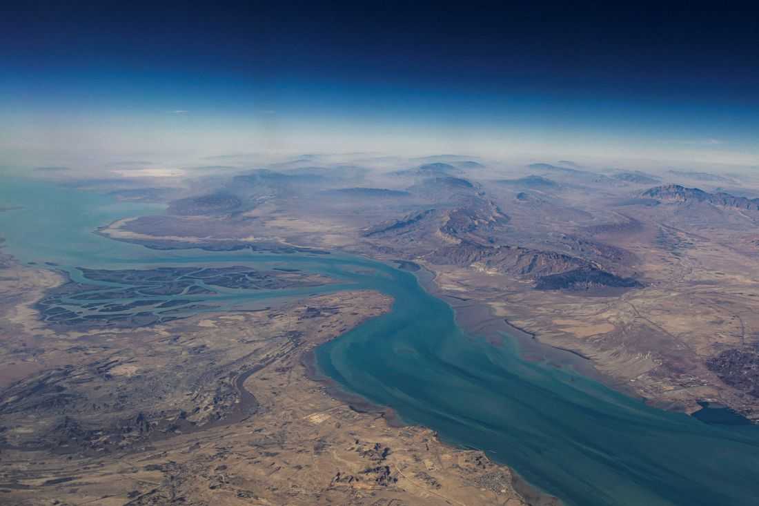 Global oil and gas shipping costs surge as Iran vows to close Strait of Hormuz