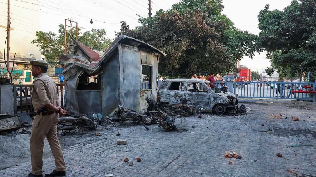 Police fire tear gas as workers' protest in India's Noida turns violent