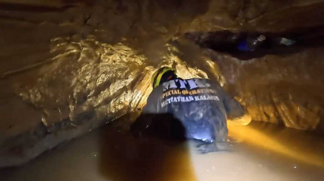 Rescue teams find five trapped in Laos cave, search for two more continues