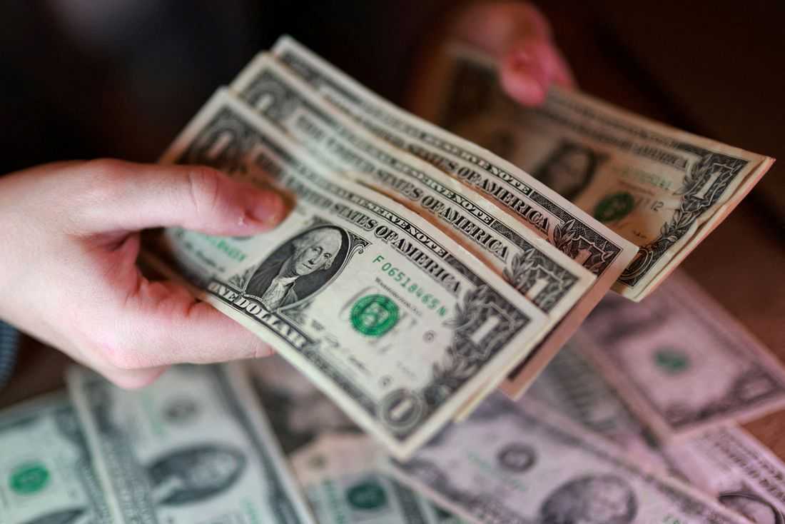 Dollar wobbles as markets cling to hopes for Middle East peace deal