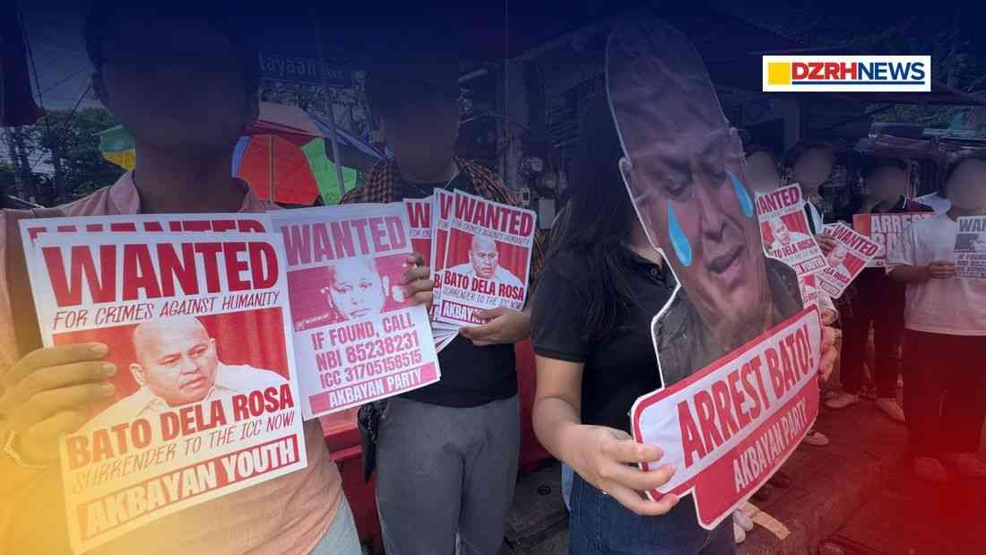 Akbayan youth distributes “wanted” posters of Sen. Bato Dela Rosa in Quezon city