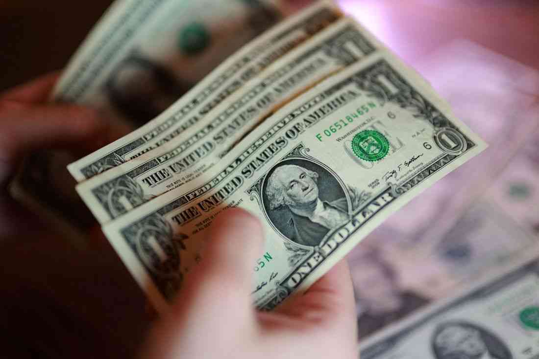 Dollar firms as US-Iran hostilities flare, yen steadied by intervention risk