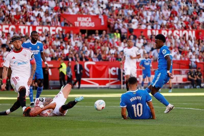 Soccer-Vinicius lifts Real Madrid to 1-0 win over Sevilla with Mbappe back in starting role