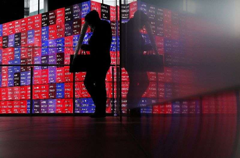 Stocks skid in Asia, bonds buckle as oil climbs