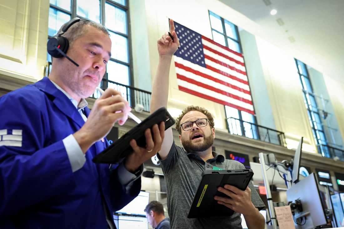 World stocks rally on AI optimism; jitters over Iran persist