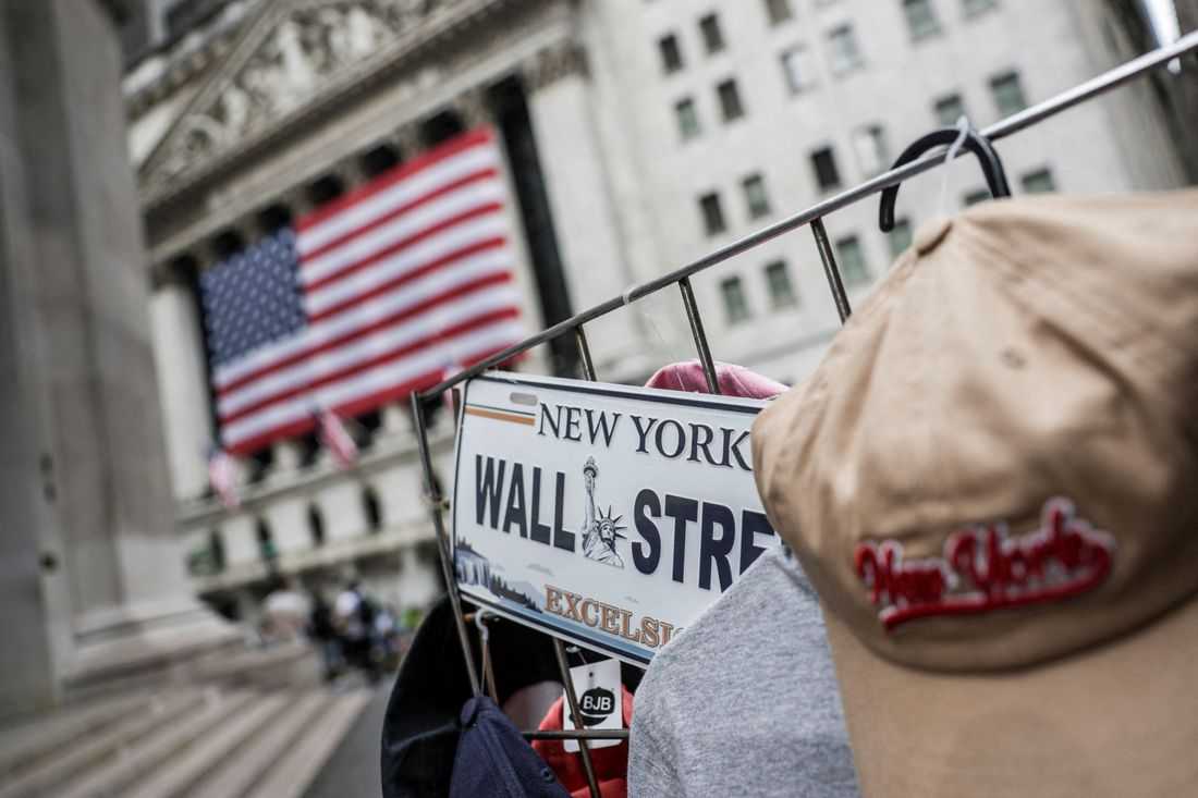 Stocks gain, oil slides as Trump says Iran deal signed