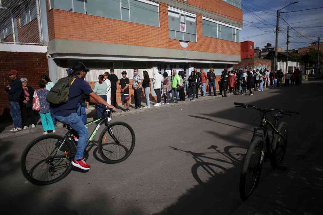 Colombia votes in runoff pitting leftist reformer against law-and-order newcomer