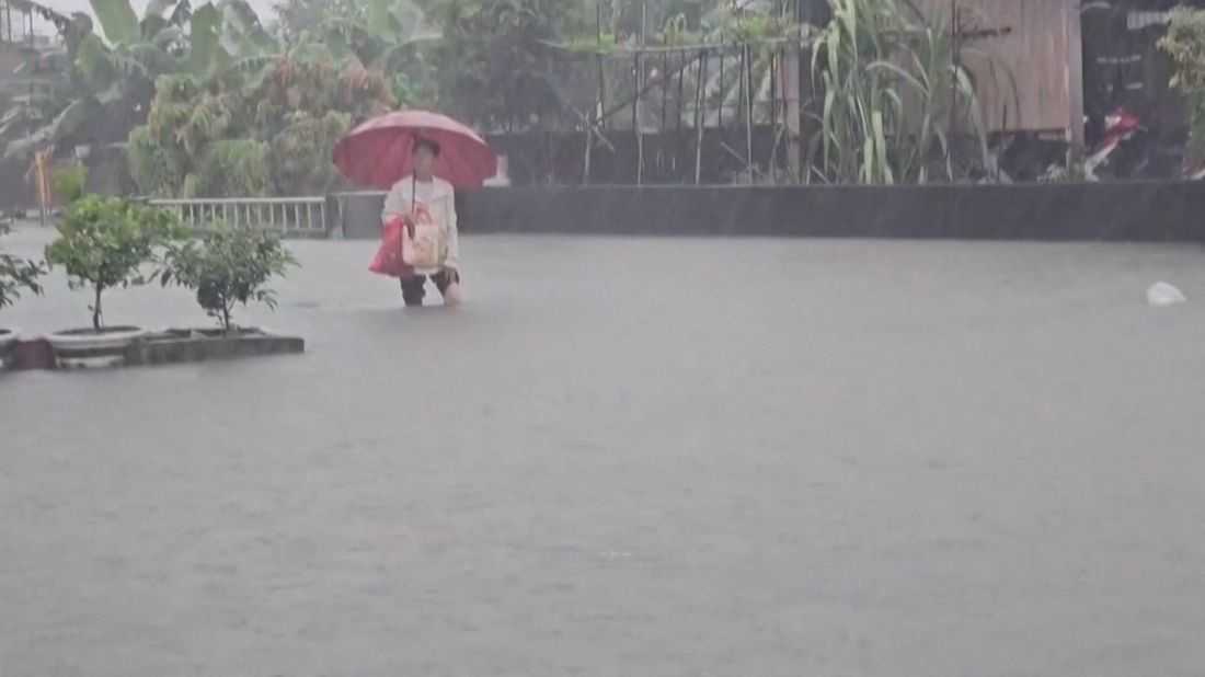 Torrential rain from passing storm shuts down parts of Taiwan and Japan