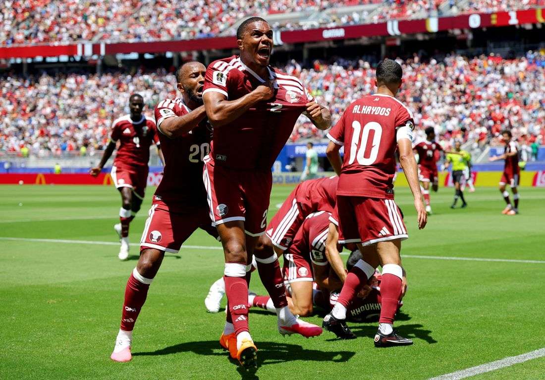 Soccer-Qatar hail first World Cup point after late goal stuns Switzerland in 1-1 draw 