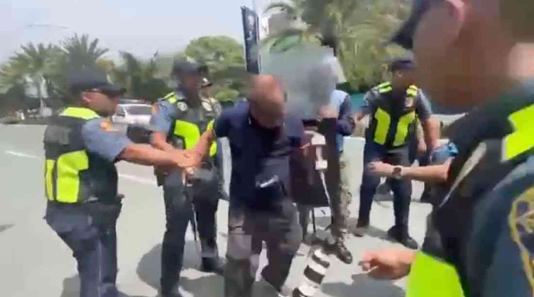 Veteran photojournalist nearly arrested amid police-protester clash at Pasay rally
