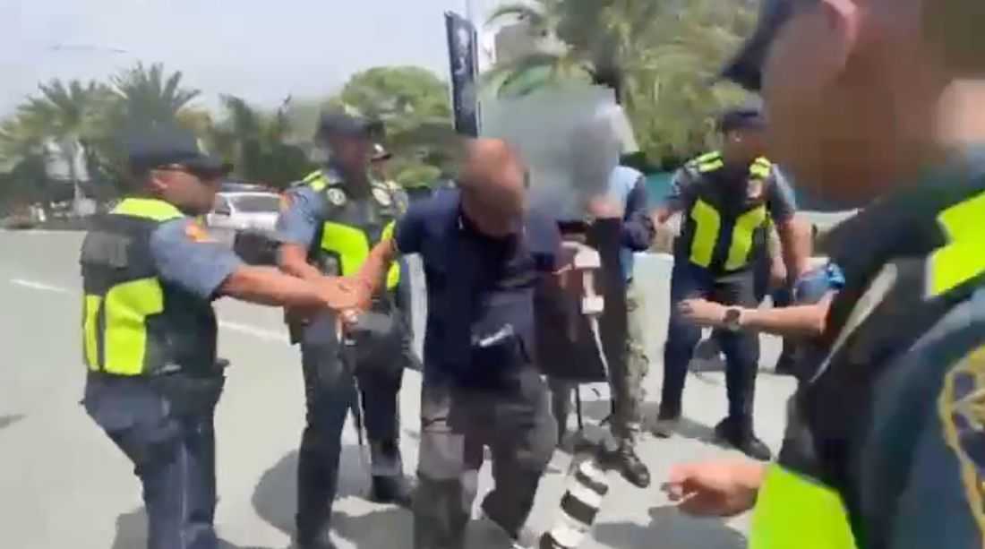 Veteran photojournalist nearly arrested amid police-protester clash at Pasay rally