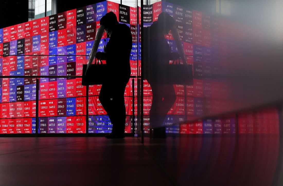 Shares, bonds make guarded gains as oil slips