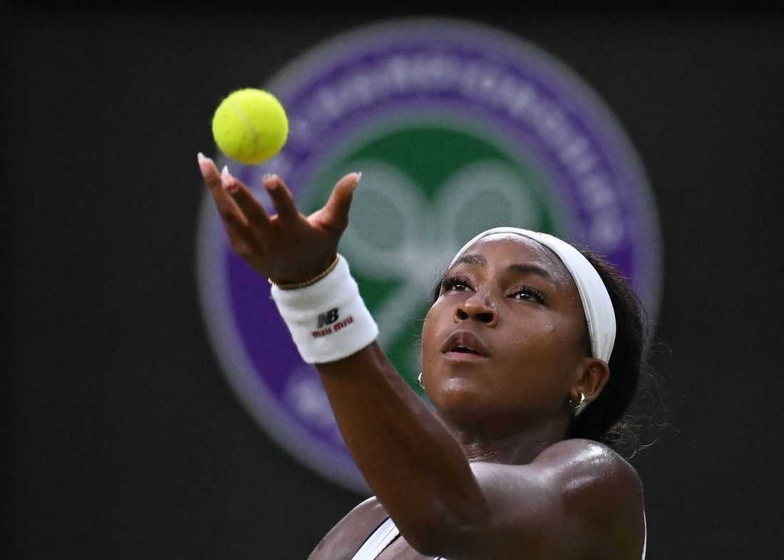 Tennis-Gauff beats Bencic and a curfew to reach first Wimbledon quarters