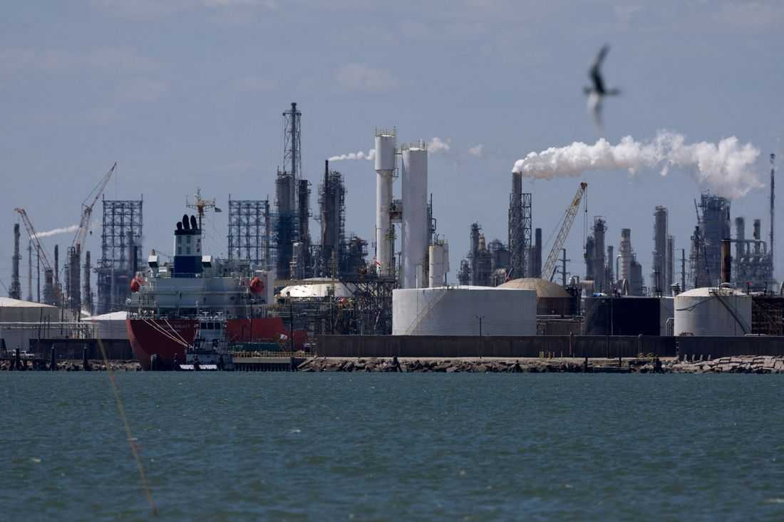 Oil drifts down after OPEC+ agrees to raise output targets