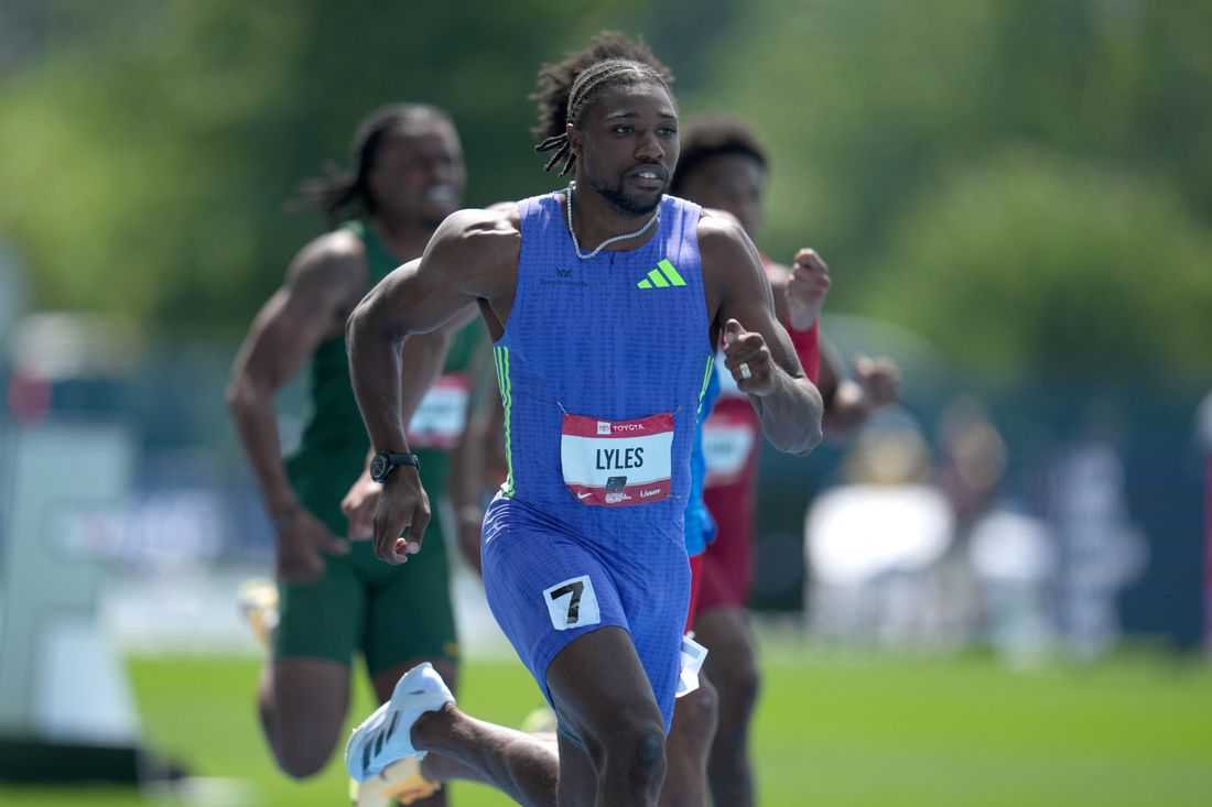 Athletics - Lyles eases injury fears after cramp halts 200m run