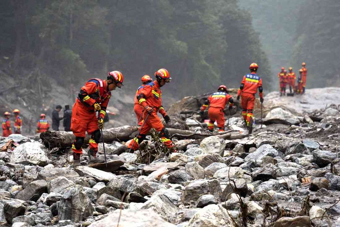 Rescuers battle floods and debris as Himalayan disaster death toll nears 800