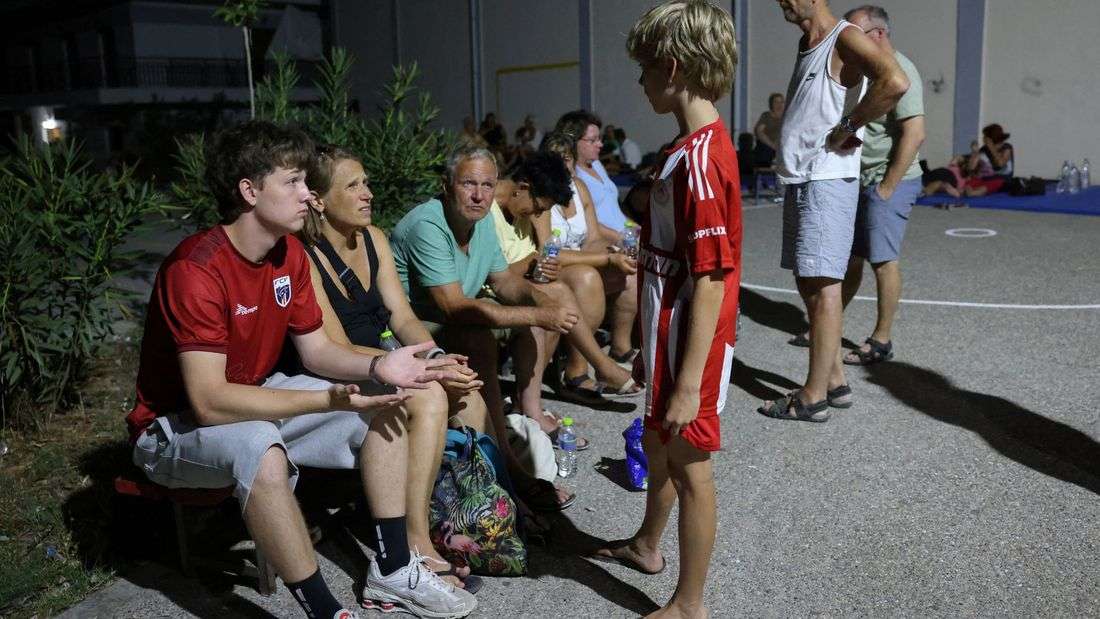 Tourists flee as Greek wildfire hits resort; Croatia also fights blaze