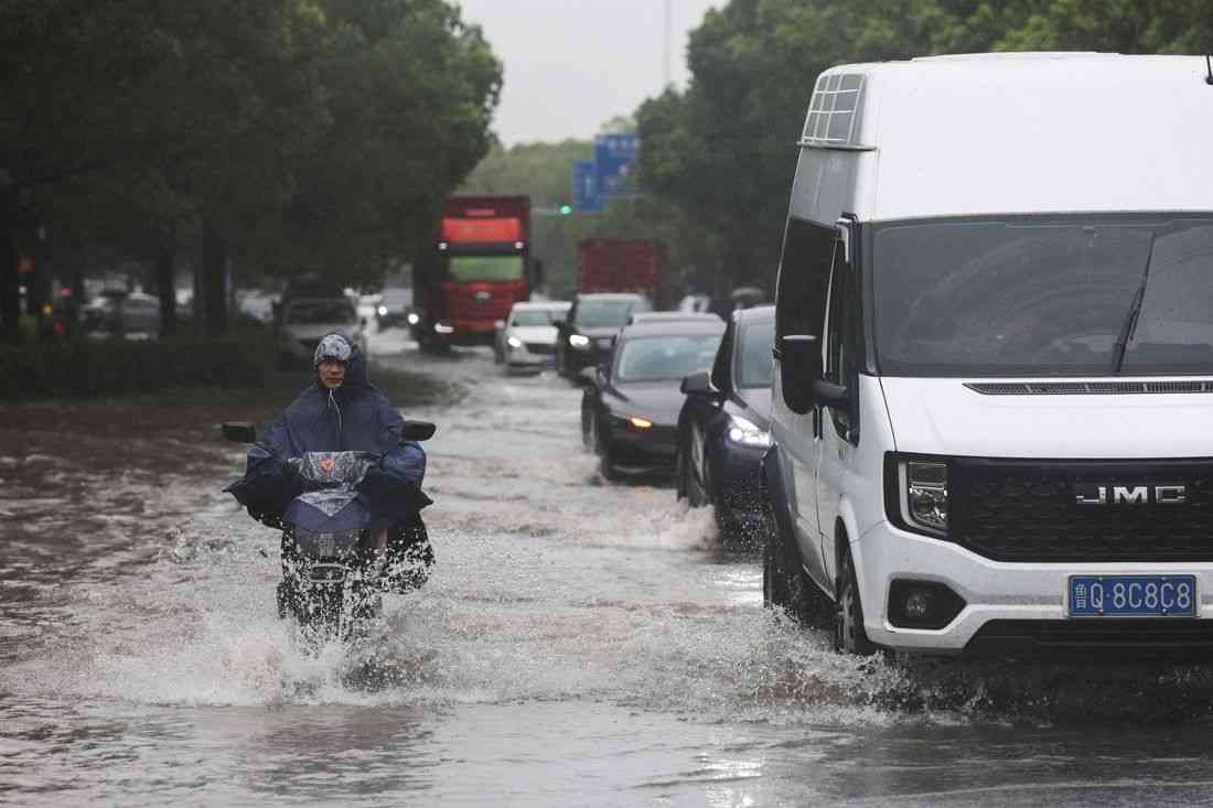 Typhoon Dolphin floods central China, puts Beijing on alert for heavy rain