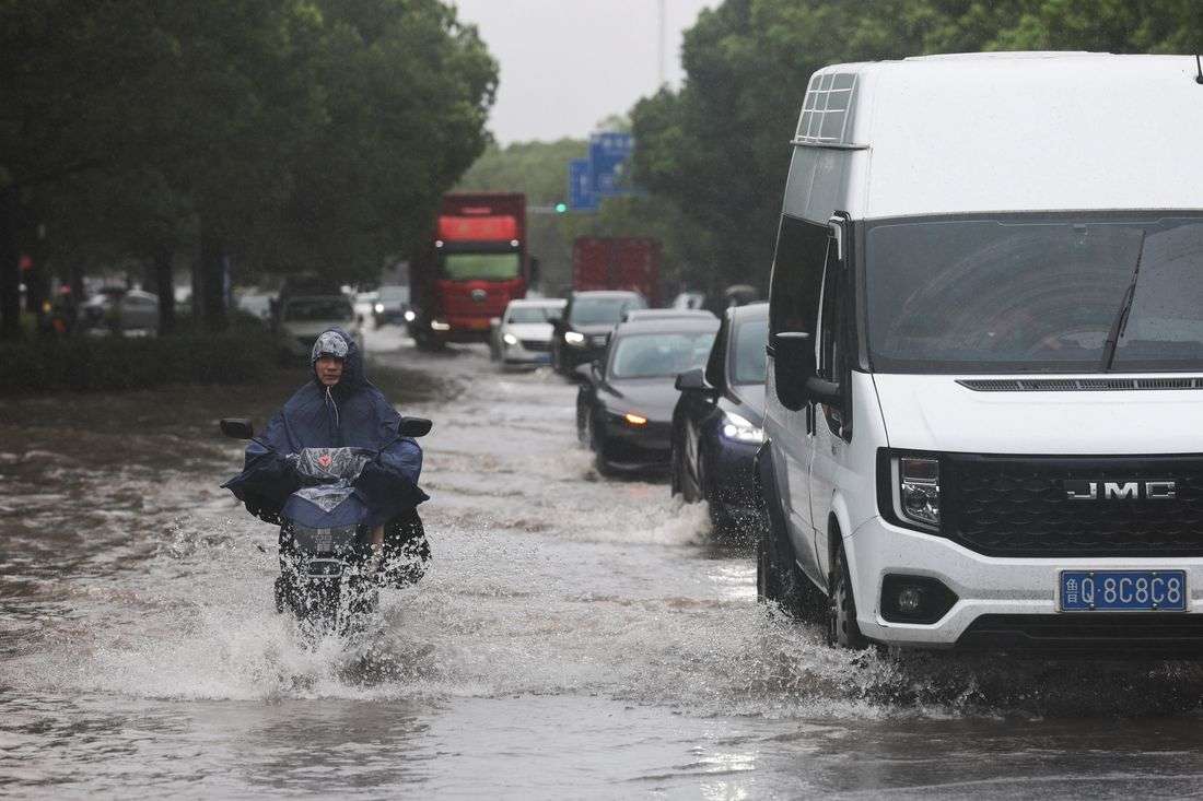 Typhoon Dolphin floods central China, puts Beijing on alert for heavy rain