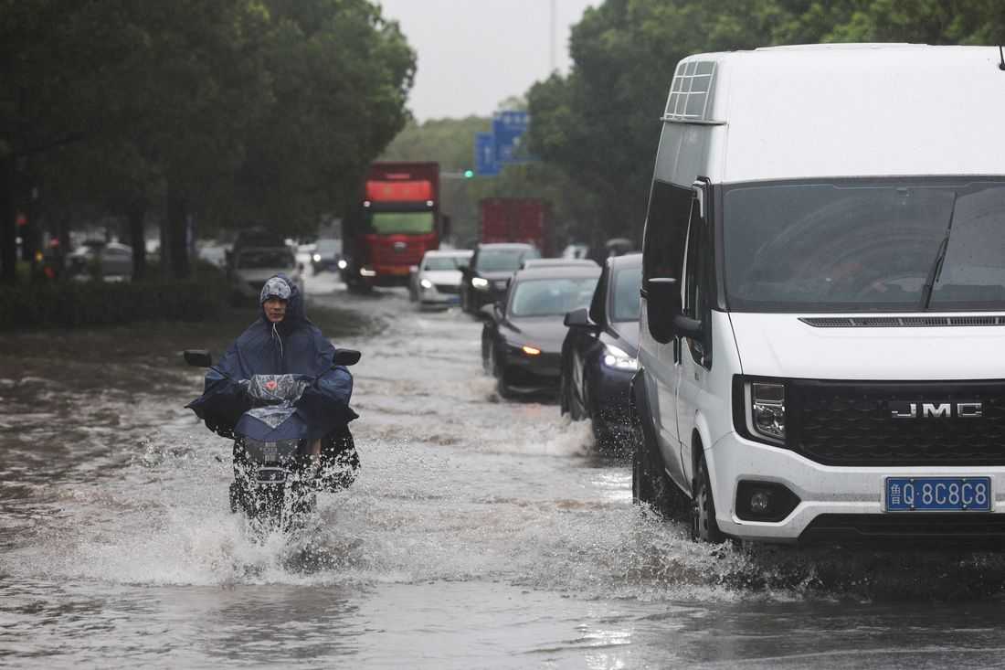 Typhoon Dolphin floods central China, puts Beijing on alert for heavy rain