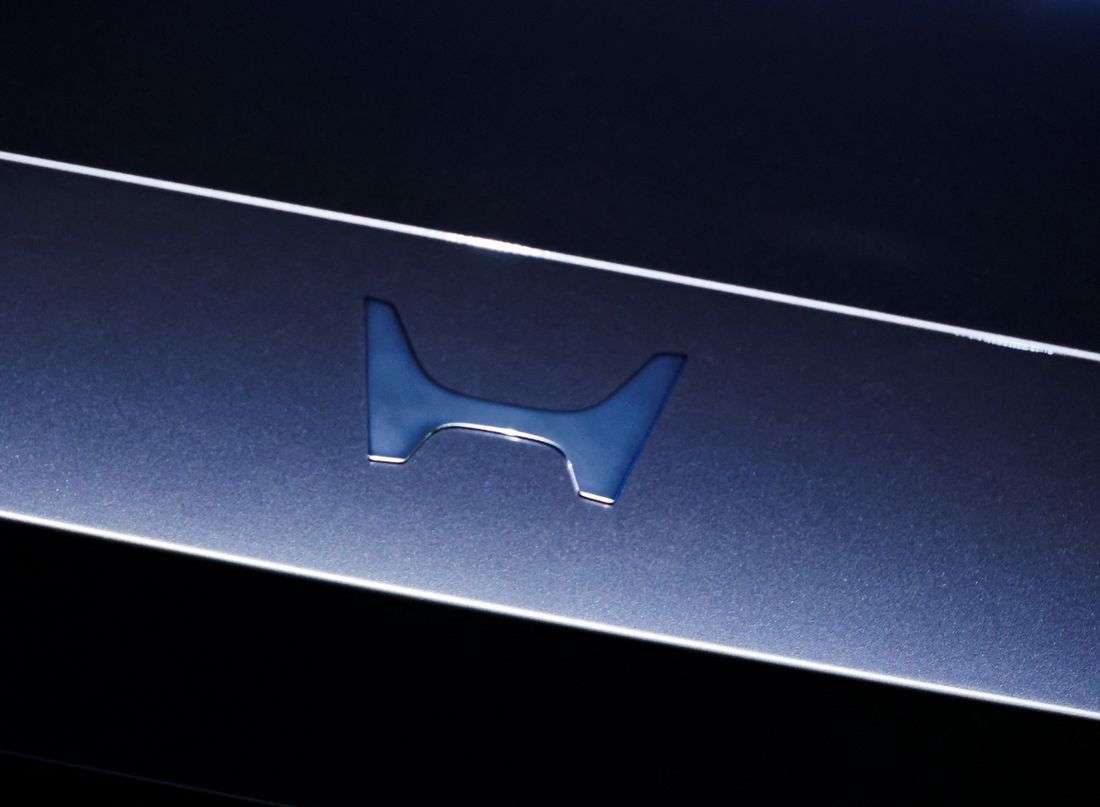 Honda raises full-year forecasts, posts first profit rise in six quarters