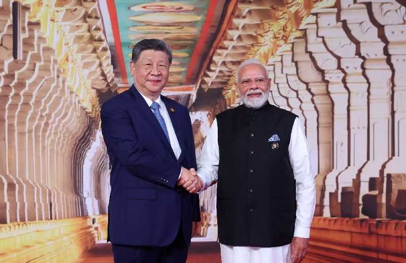 India's Modi and China's Xi push business links, border peace as ties revive