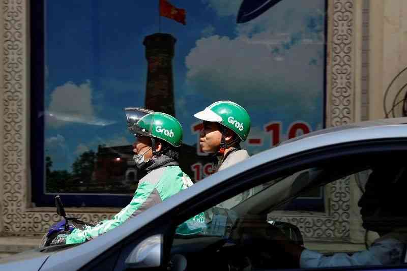 Vietnam's Grab drivers call for two-day app boycott over falling earnings