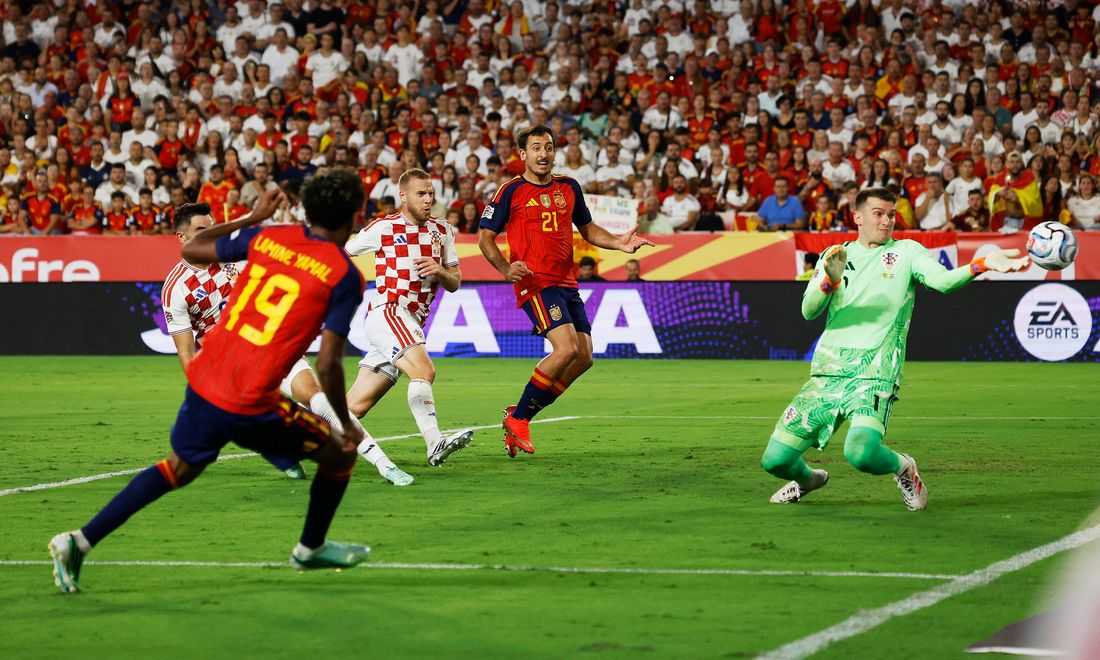 Soccer-Lamine nets double as Spain win again and England beat 10-man Czechs