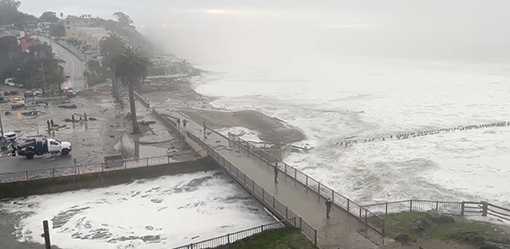 Big waves at California's Mavericks Beach draw surfers, 'super stoked' spectators