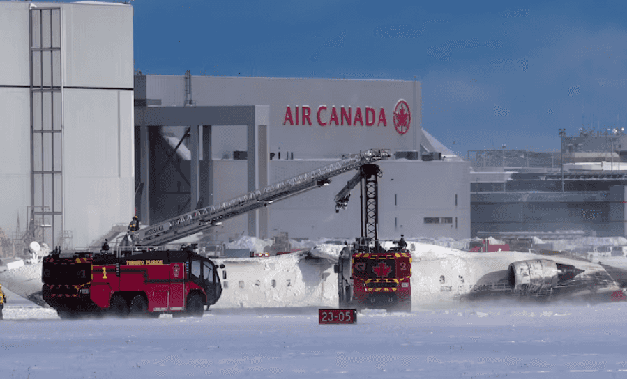 Delta plane flips on landing at Toronto airport, injuring 8