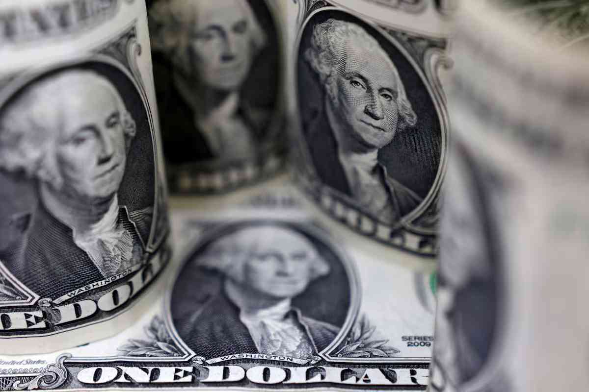 Dollar set for weekly gain as firm US data tempers Fed easing bets