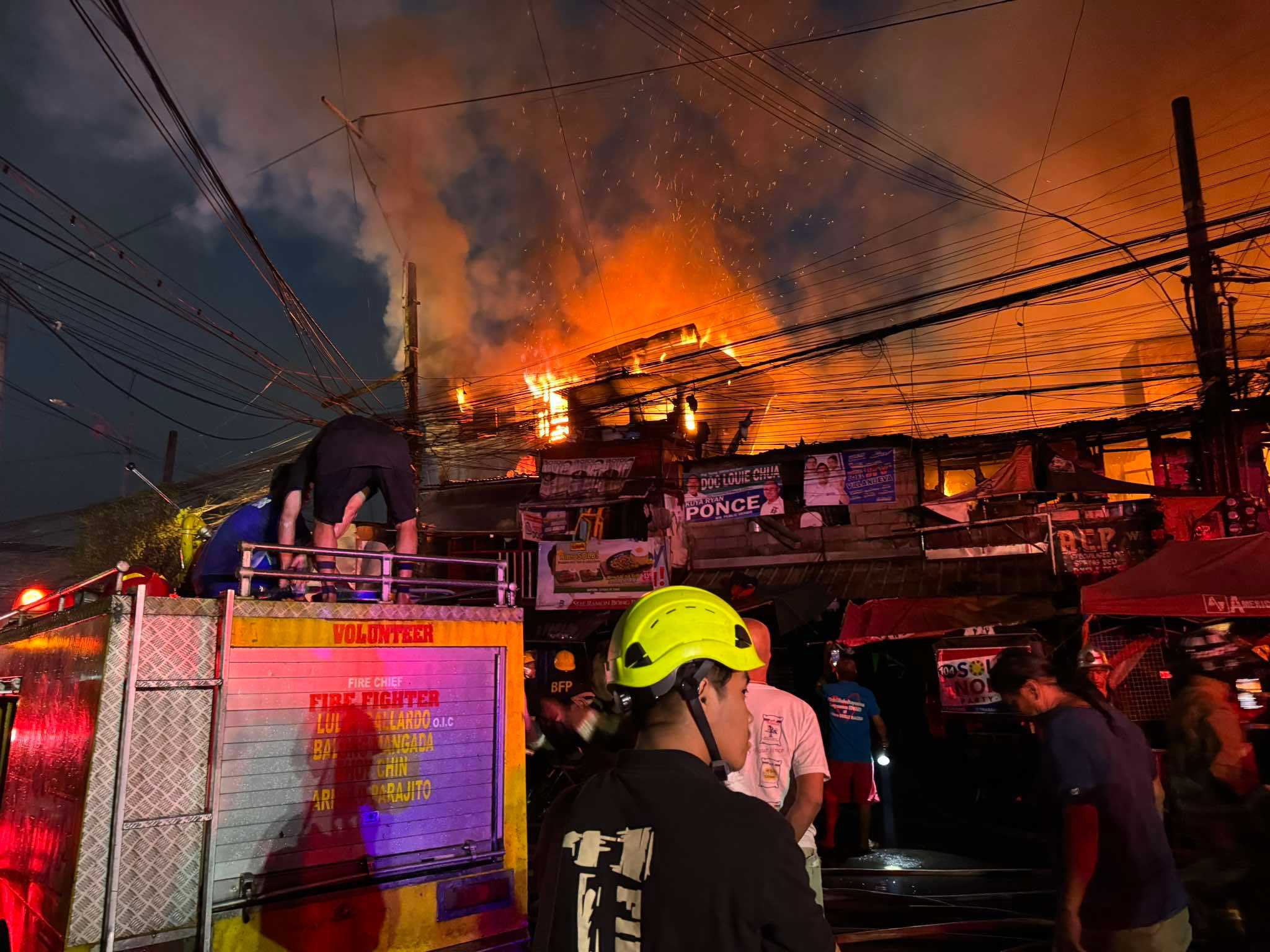 Fire engulfs residential area in Sampaloc, Manila, burning down up to 100 houses