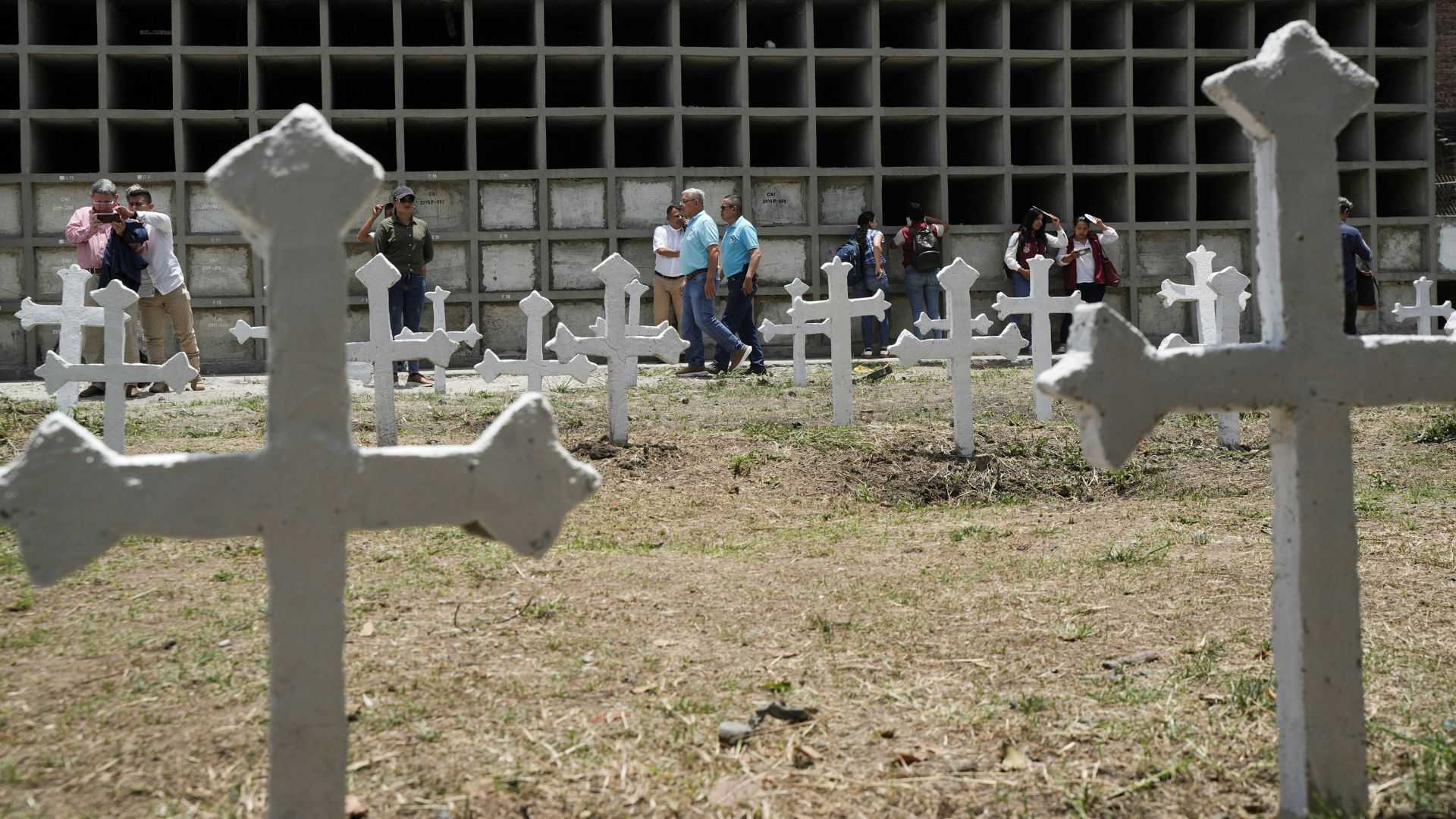 Former Colombian rebels and soldiers work together to exhume remains, give families closure