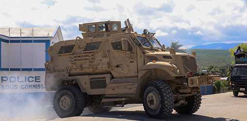 Haitian gangs press fresh attacks as families mourn massacre