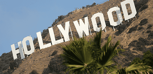 Hollywood workers union reaches pay, AI-use deal with top studios