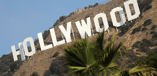 Hollywood workers union reaches pay, AI-use deal with top studios
