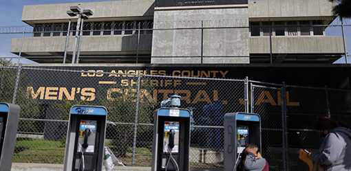 Insight: U.S. bail-bond insurers spend big to keep defendants paying