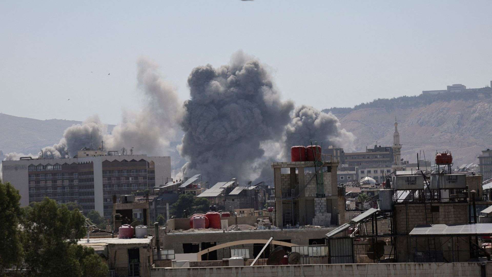 Israel launches heavy airstrikes in Damascus, vowing to protect Druze