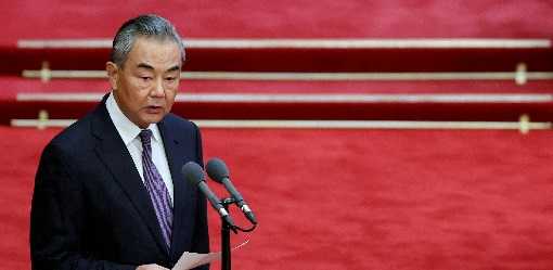 Japan's top diplomat raises concerns with China's Wang about stabbings, military activity