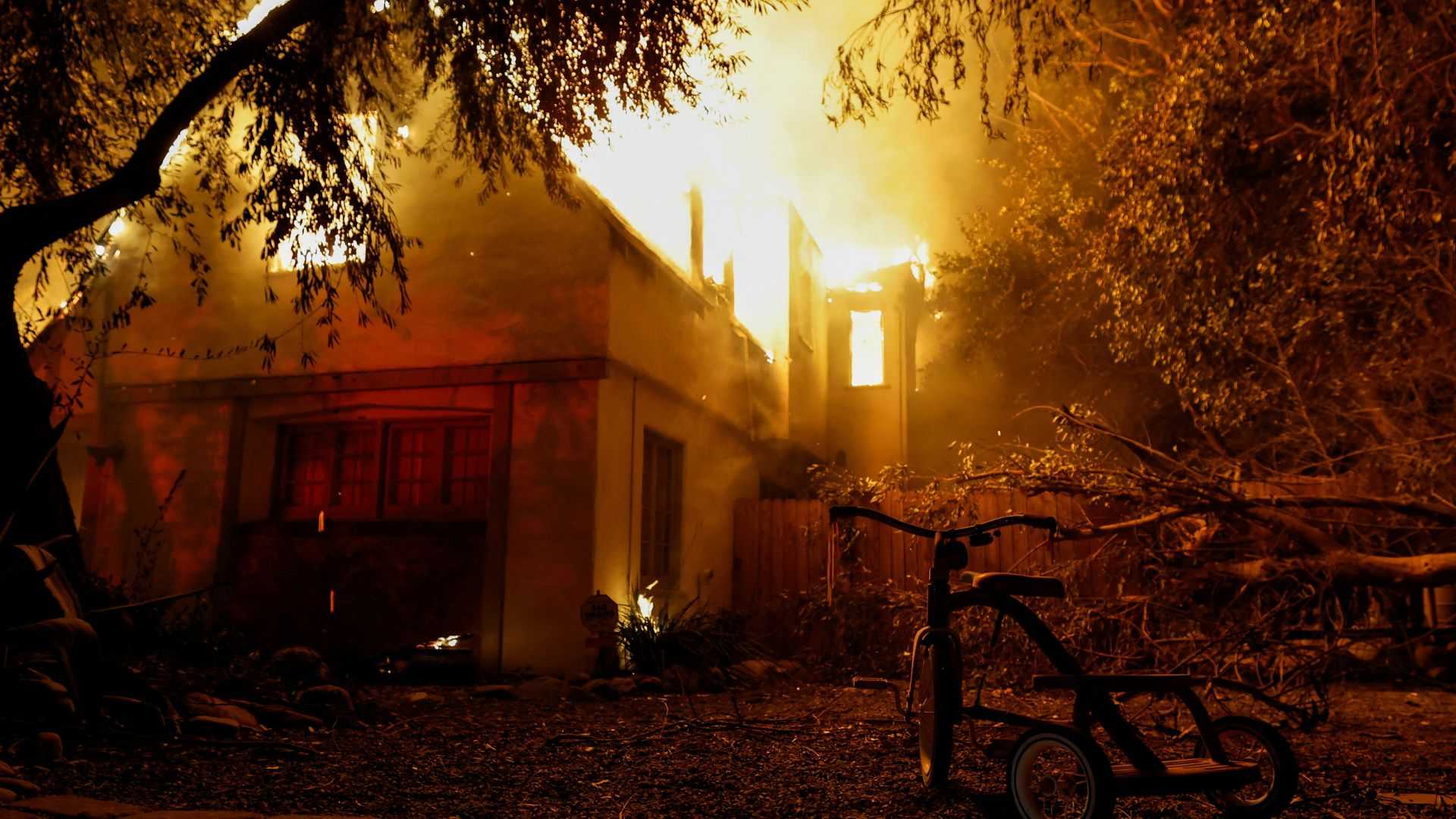 Los Angeles wildfires spread to Hollywood as 100,000 ordered to evacuate