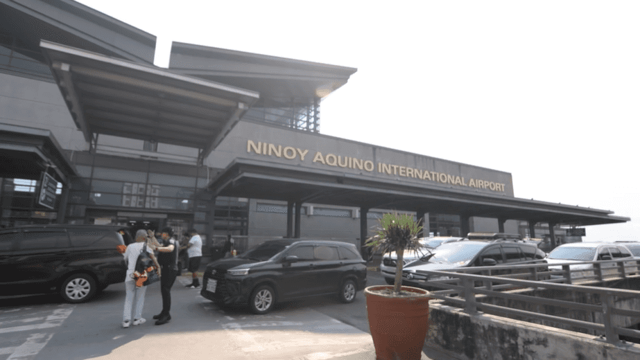 NAIA security personnel no longer allowed to touch passports