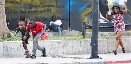 Over 50,000 fled Haiti capital in three weeks, with politicians in deadlock