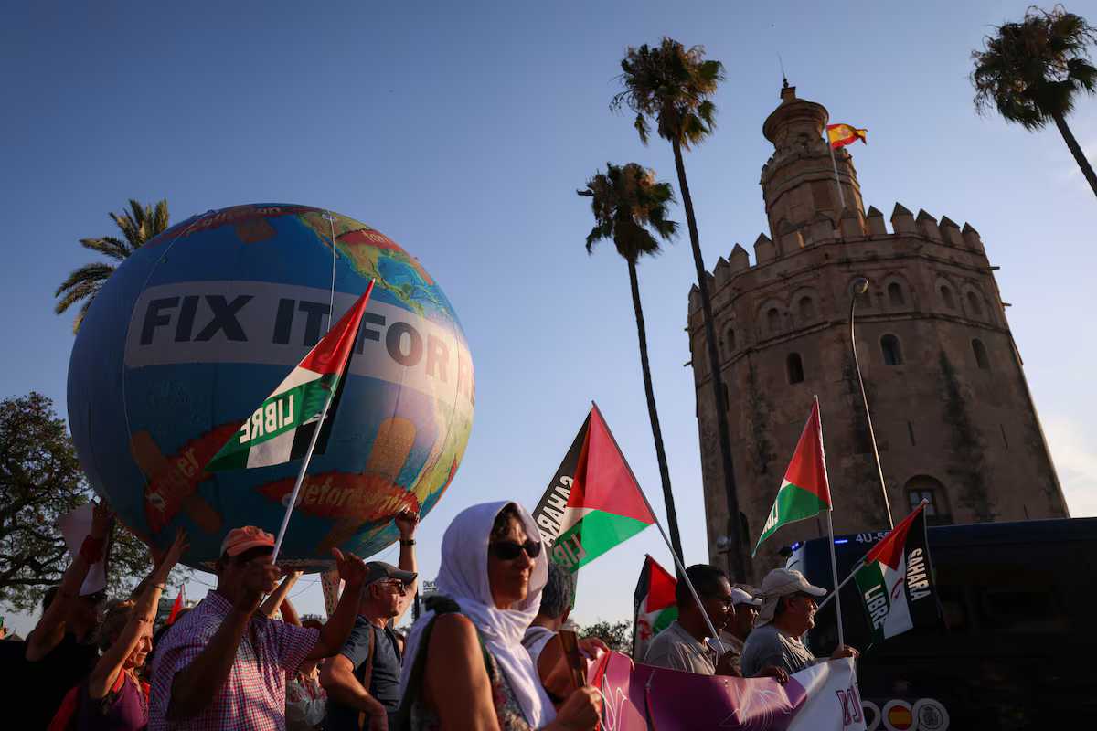 Protesters demand debt cancellation, climate action ahead of UN summit
