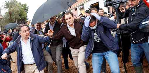 Protests over Spain flood response interrupt king's visit to stricken Valencia suburb