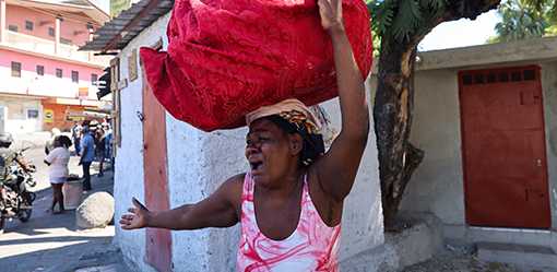 Residents in Haiti's capital flee homes as gangs expand control