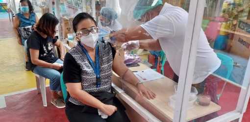 Robredo receives her first dose of COVID-19 vaccine