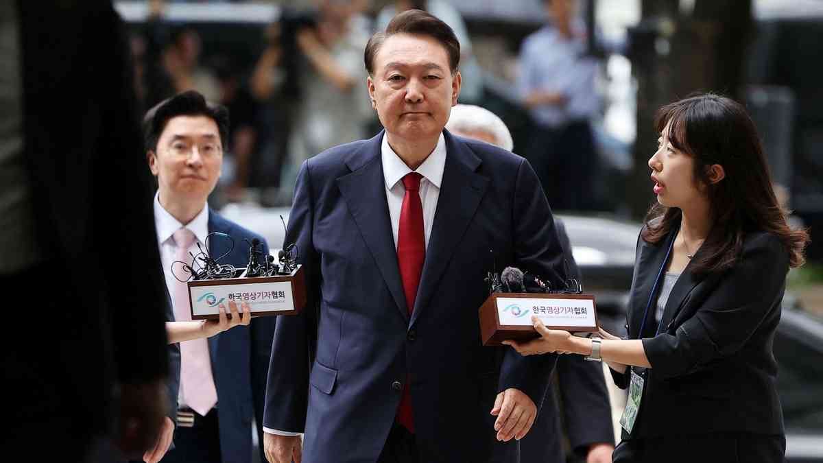 South Korea's former President Yoon attends hearing on detention warrant