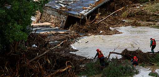 Three dead, three missing after downpours in Spain cause widespread floods